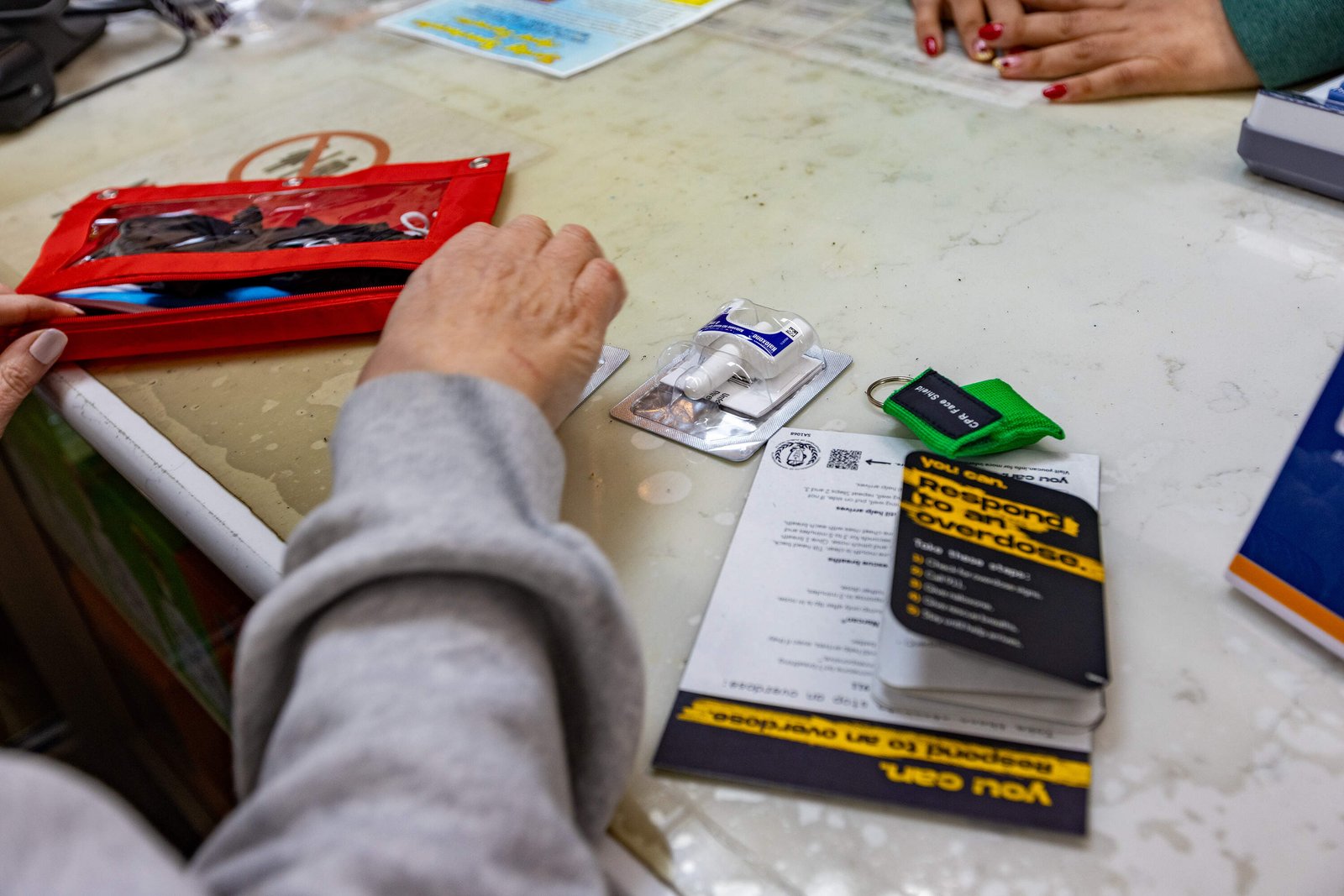Pastors who participate in the training will receive small kits containing two doses of naloxone, instructions, medical masks and gloves. (Jesse Costa/WBUR)