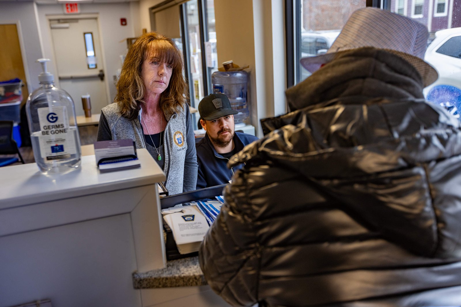 CarrieAnn Salemme of Revere's Substance Use Disorder and Homeless Initiatives Office holds weekly clinics at a police station so people can get help dealing with their needs. (Jesse Costa/WBUR)