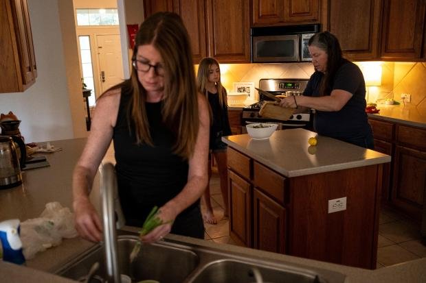 Jessica Edgar-Corum, her daughter Ivy Edgar, 10, and wife Jamie...