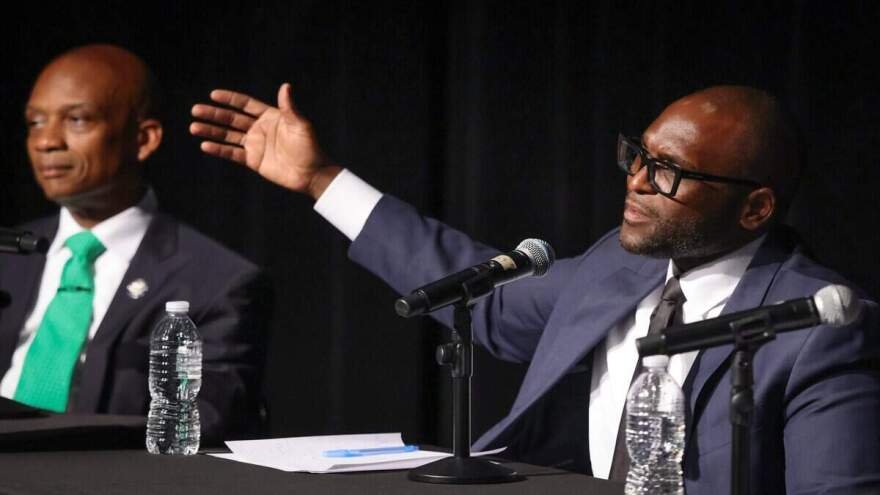 Candidate and State Senator Shevrin Jones (right) answers a question during the debate.
