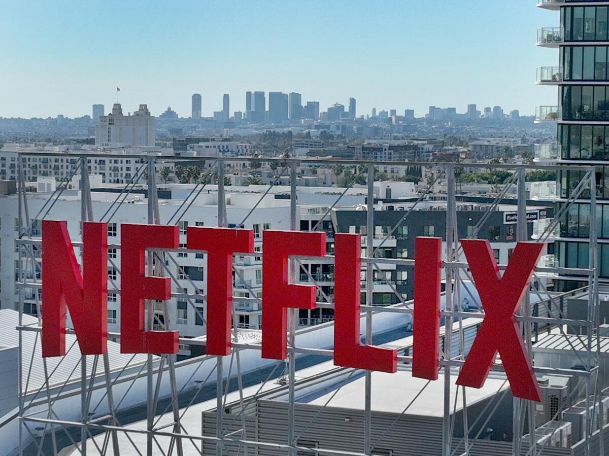 Hollywood's open secret: It's fighting AI - and is already addicted to it 8 An exterior view of the Netflix sign at Netflix on Vine in Hollywood in 2025.