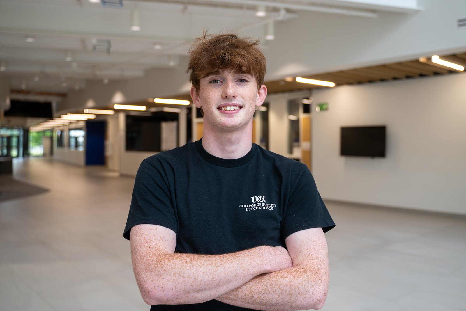 Thomas Safago poses for a photo in Discovery Hall.