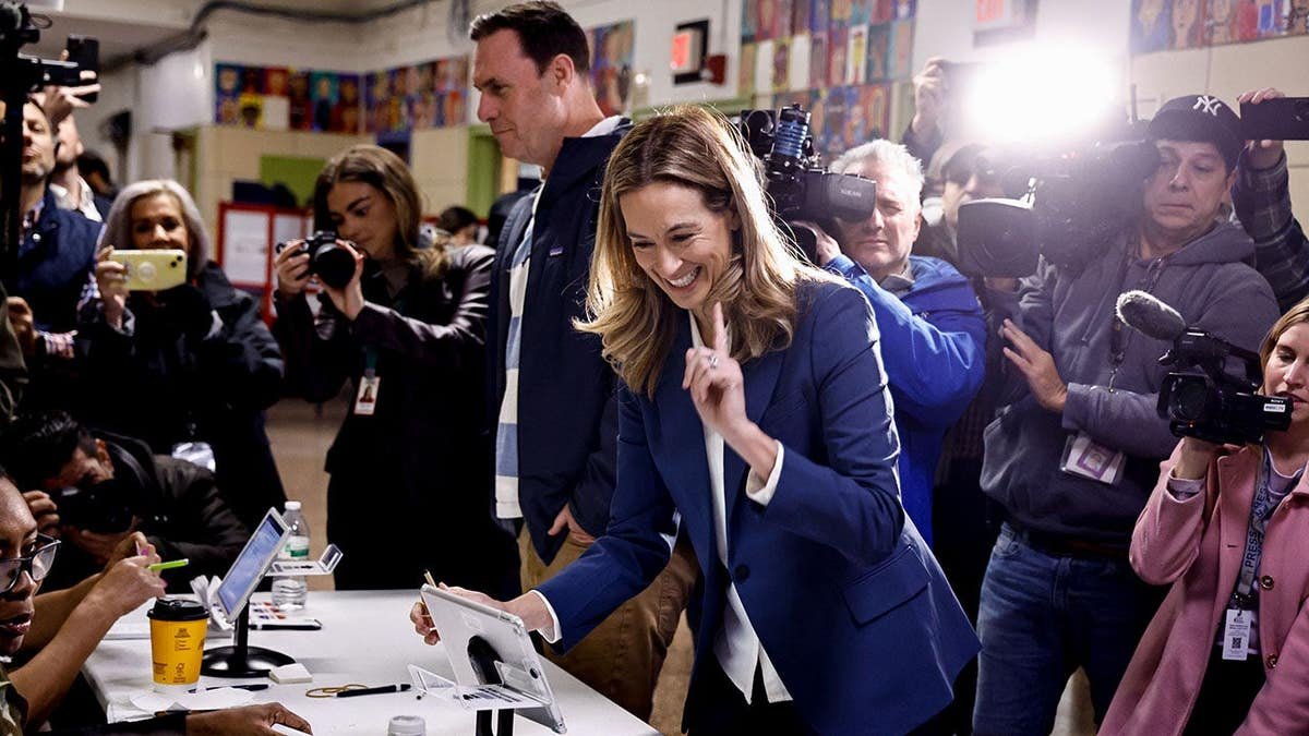 Representative Mikie Sherrill casts her vote at the polling station at Hillside Elementary School