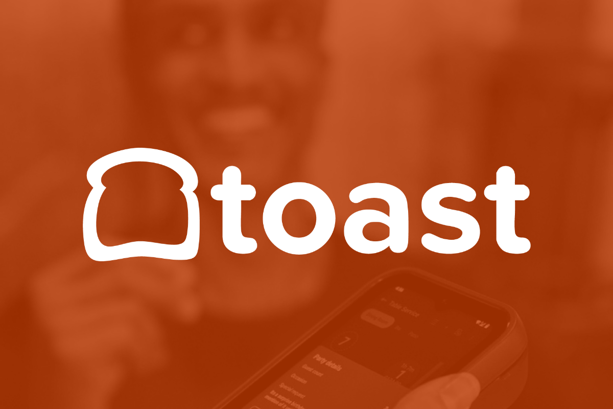 White Toast logo on an orange-brown background.
